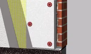 Warstwa styropianu z siatką i listwą startową do termoizolacji budynku.