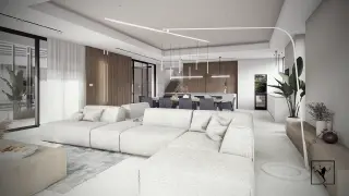Nowoczesny salon z jadalnią, jasne meble, drewniane akcenty, designerskie oświetlenie.