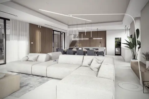 Nowoczesny salon z jadalnią, jasne meble, drewniane akcenty, designerskie oświetlenie.